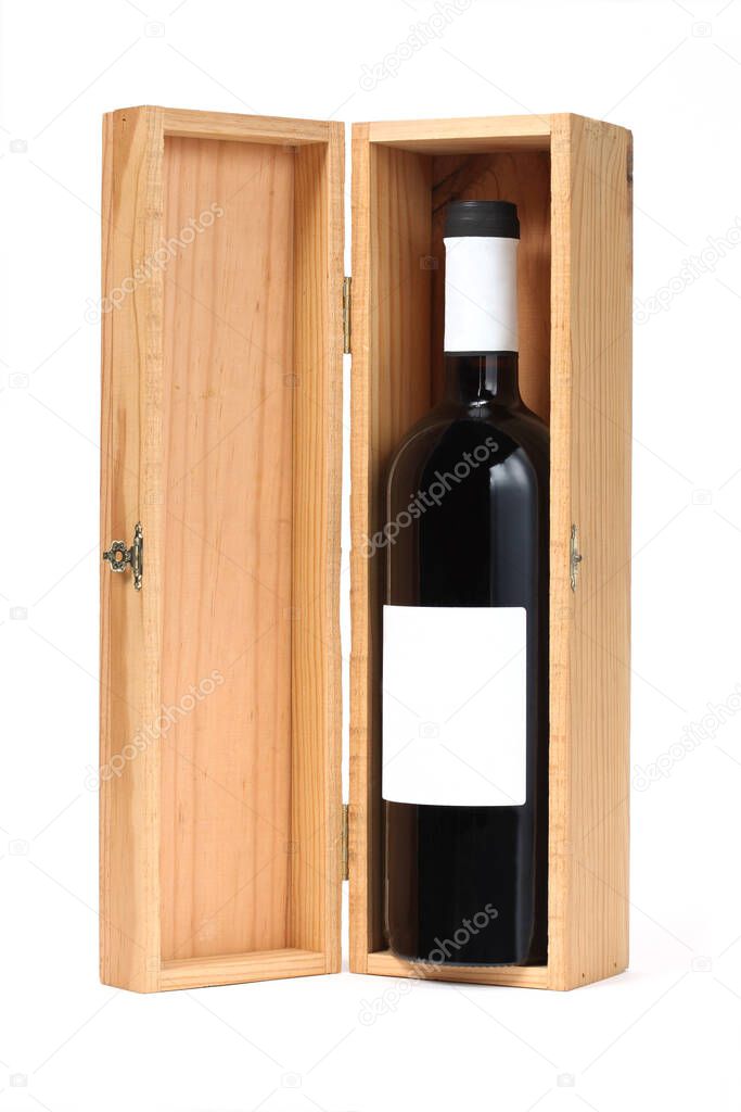 open wooden wine box with a bottle of red wine inside isoaleted on white background with clipping path and copy space for your text