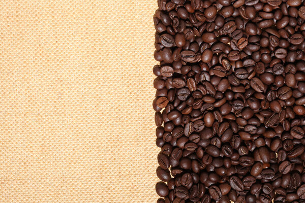 coffee beans on a canvas with copy space for yopur text