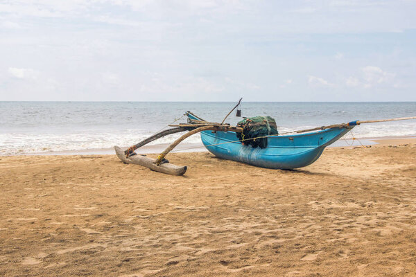 fishing boat on beach in sri lanka