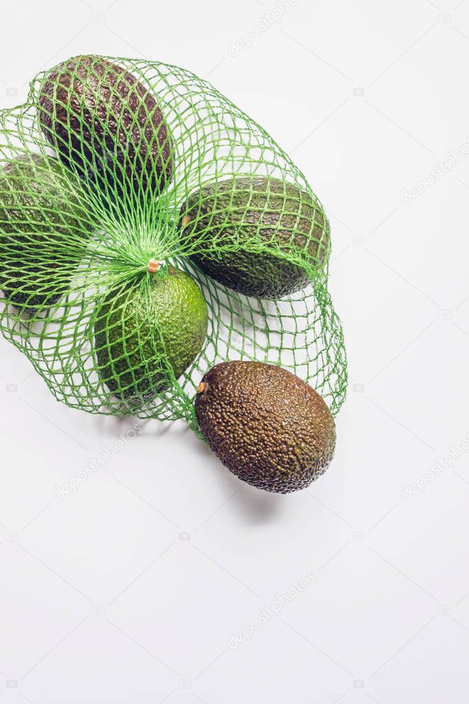 organic avocado in mesh bag