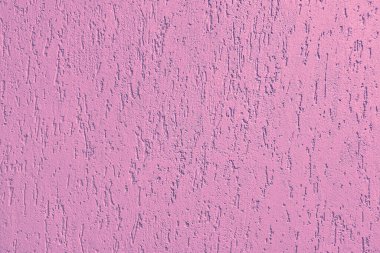 Dekoratif desenli duvar sıva kabuğu böcek pembesi. Pembe pürüzlü yüzey