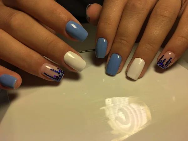 Fashionable Blue Manicure White Design Blue Pawns Light Background — Stock Photo, Image