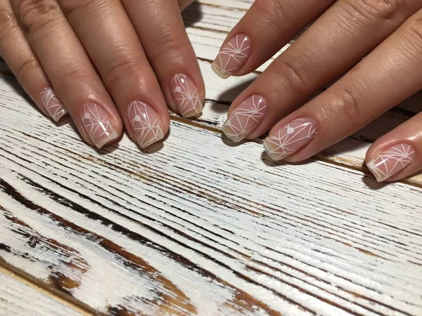 Fashionable white stamping design on nails — Stock Photo, Image