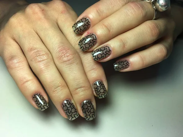 fashionable autumn black manicure with stained glass design