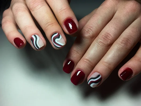 fashion red manicure with color design on short nails
