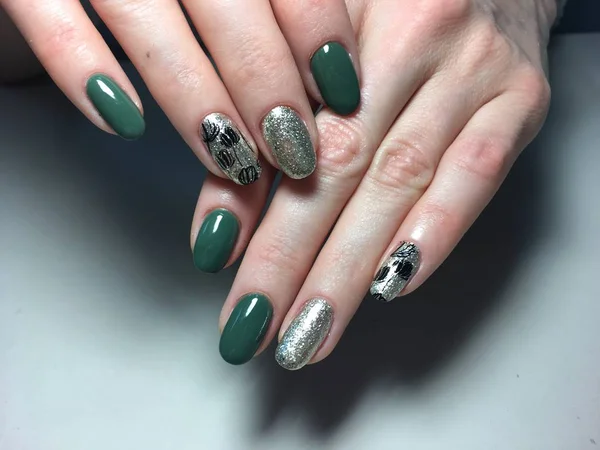 trendy green manicure on a textural