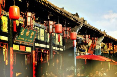 Pingyao, China - May 19, 2017: The decoration of red lampions on the streets of Pingyao Ancient Town China. clipart