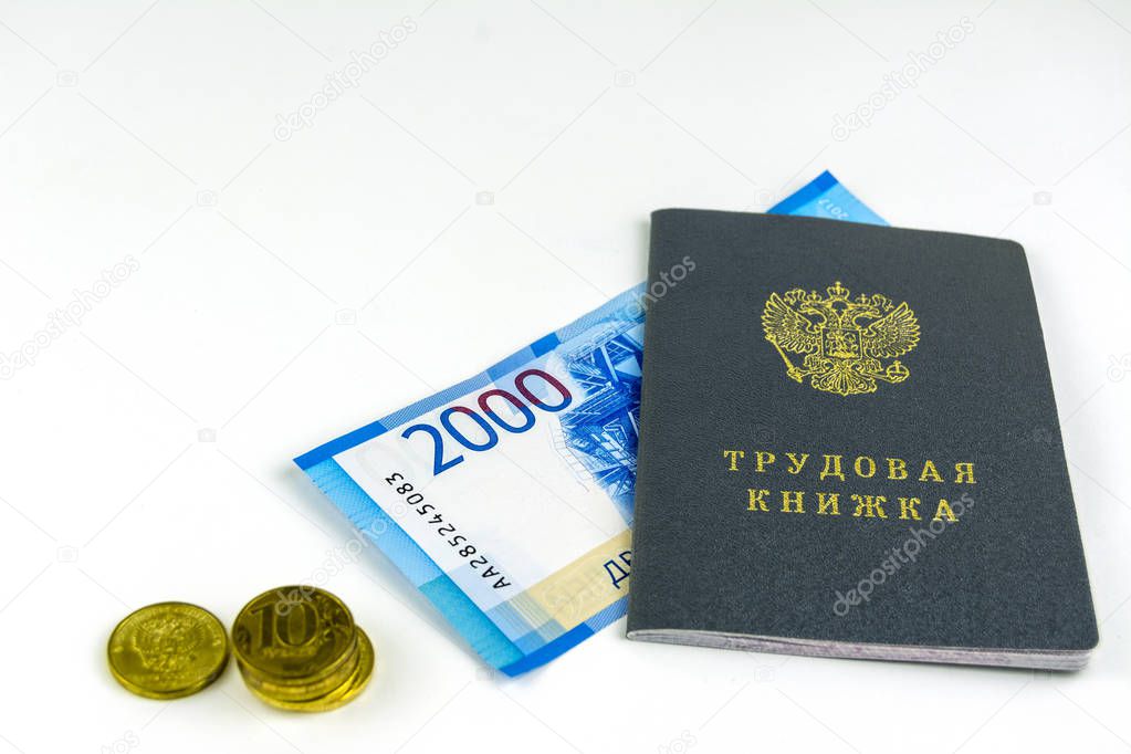 Russian documents. Work book,employment record, a document to record work experience. Russian cash, banknotes 2000 rubles and several coins. On white