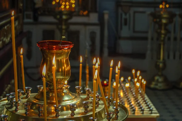 Burning candles in the Church. The usual kind of for Russian Church.