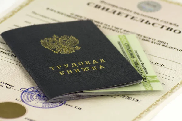 Russian documents. Work book, employment record, a document to record work experience. Certificate of pension insurance. Certificate of TIN