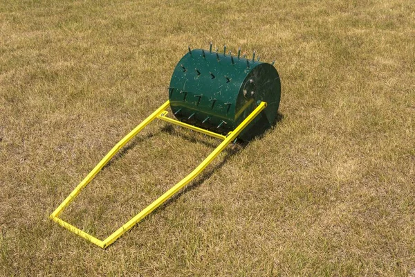 A special roller for the handling and laying of the lawn. — Stock Photo, Image