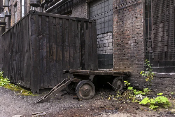 Old metal truck for use at the plant. Yard inside the factory. — Stock Photo, Image