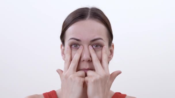 Portrait Smiling Brunette Girl Doing Exercise Strengthening Lower Eyelids Isolated — Stock Video