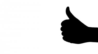 Jest başparmak veren erkek bir elin parmaklarını. El içine belgili tanımlık çerçevelemek yukarıdan geliyor. Siluet vurdu. 