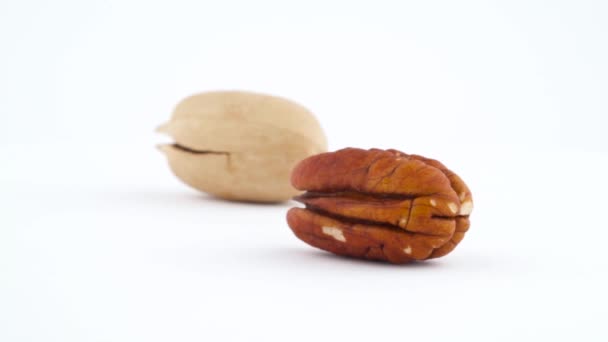 One Cracked Pecan Nut Kernel Pecan Nut Slowly Rotating Turntable — Stock Video
