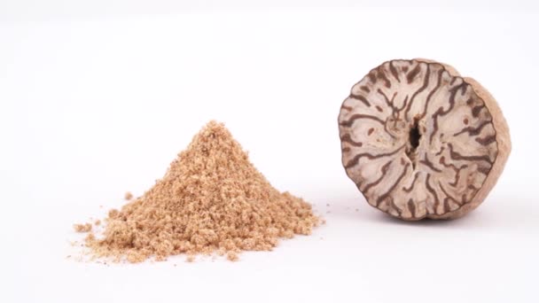 Macro Shooting Nutmeg Seed Pile Nutmeg Powder Slowly Rotating Turntable — Stock Video