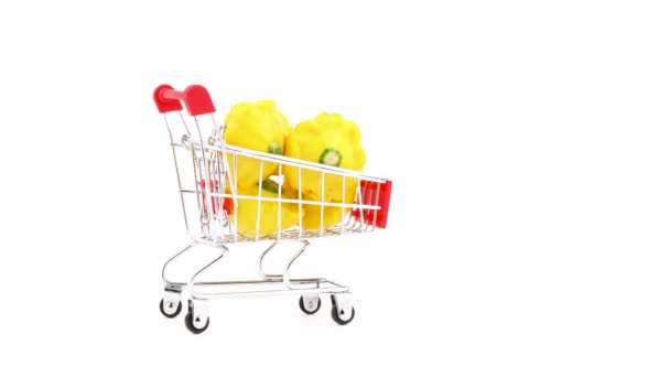 Supermarket Trolley Shopping Cart Yellow Pattypan Squashes Moving Frame Isolated — Stock Video