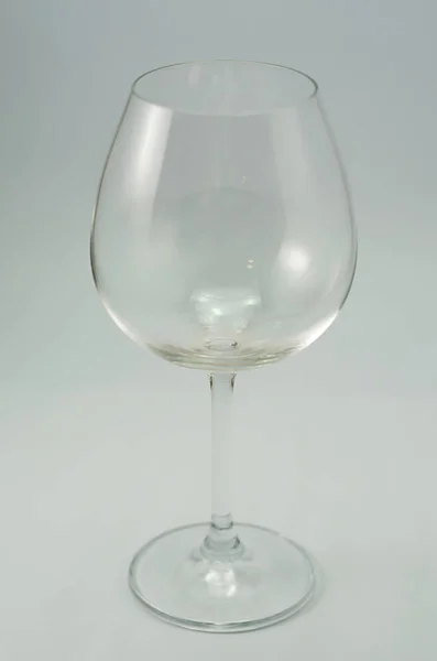 Glass of wine on white background for various uses.