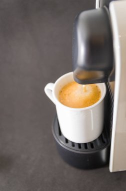 Coffee maker serving coffee, espresso, coffee pod. clipart