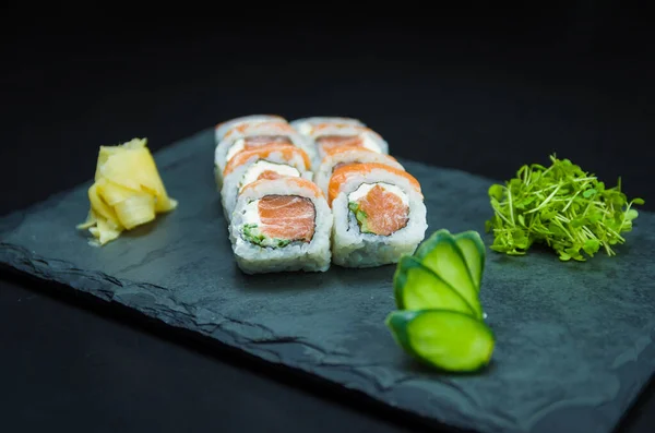 Sushi Traditional Japanese Cuisine Delicious Uramaki Decorated Plate Black Background — Stock Photo, Image