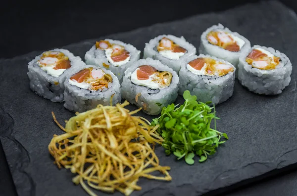 Sushi Traditional Japanese Cuisine Delicious Uramaki Decorated Plate Black Background — Stock Photo, Image