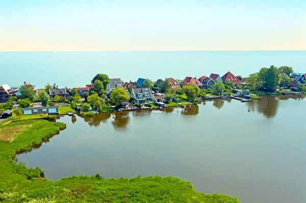 Aerial from the traditional village Uitdam at the IJsselmeer in — Stock Photo, Image