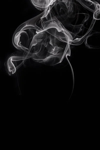 Abstract white smoke or steam swirls on black background — Stock Photo, Image