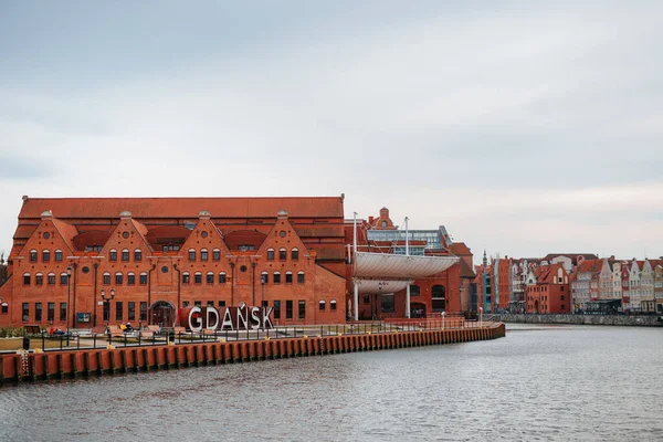 The old town of Gdansk in Poland Polska and the motlawa river with beautiful old polish stile houses. Stock Picture