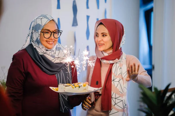 Two Muslim Malay Woman Smiling Celebrating Birthday Holding Cake Sparklers — Stock Photo, Image