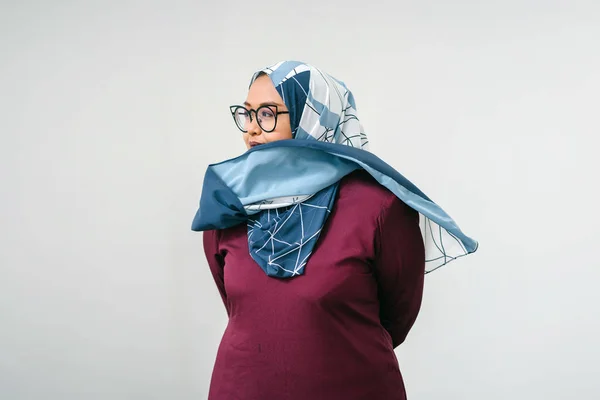 asian woman wearing hijab, half length portrait