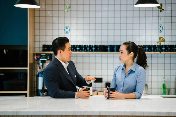 Two Business People Discussing Project Sitting Table Drinking Coffee Kitchen — Stock Photo, Image