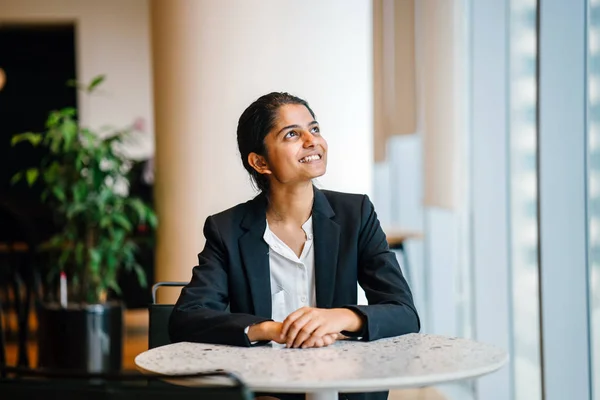 Young Smiling Businesswoman Suit Sitting Table Looking Away — Stock Photo, Image