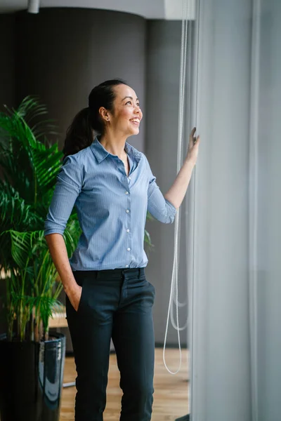 Portrait Young Confident Asian Businesswoman Laughing Standing Window — Stock Photo, Image