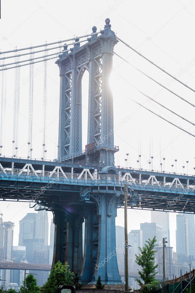 Brooklyn Bridge with skyline on background