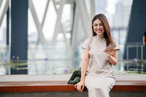 Attractive Young Asian Woman Using Smartphone — Stock Photo, Image