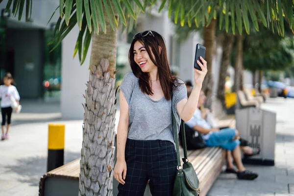 Attractive Young Asian Woman Using Smartphone — Stock Photo, Image