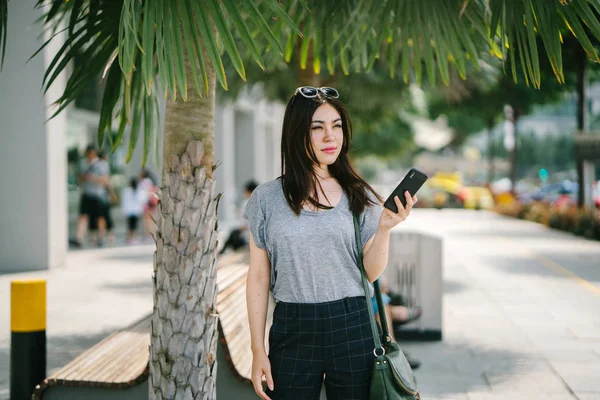 Attractive Young Asian Woman Using Smartphone — Stock Photo, Image