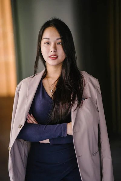 portrait of a confident, young, beautiful and confident Asian woman