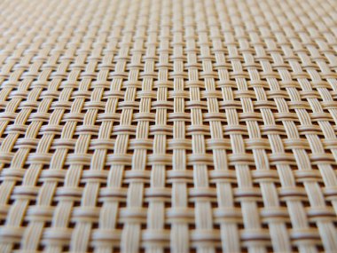 bej kumaş plastik kafes, kılavuz doku Close-up; yatay ve dikey iç içe satır deseni arka plan olarak kullanılabilir; perspektif içinde odak merkezi ile çekilmiş fotoğrafı