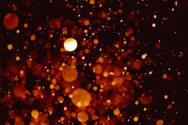 Bokeh 'te noel arkaplanı deseni soyut ışık parıldayan yıldızlar. simli klasik ışık arkaplanı