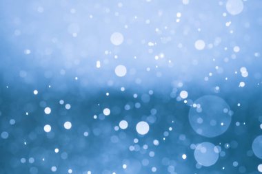 Bokeh 'te noel arkaplanı deseni soyut ışık parıldayan yıldızlar. simli klasik ışık arkaplanı