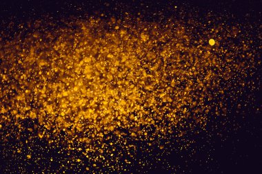 Bokeh 'te noel arkaplanı deseni soyut ışık parıldayan yıldızlar. simli klasik ışık arkaplanı