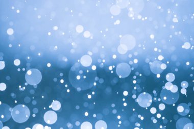 Bokeh 'te noel arkaplanı deseni soyut ışık parıldayan yıldızlar. simli klasik ışık arkaplanı