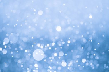 Bokeh 'te noel arkaplanı deseni soyut ışık parıldayan yıldızlar. simli klasik ışık arkaplanı