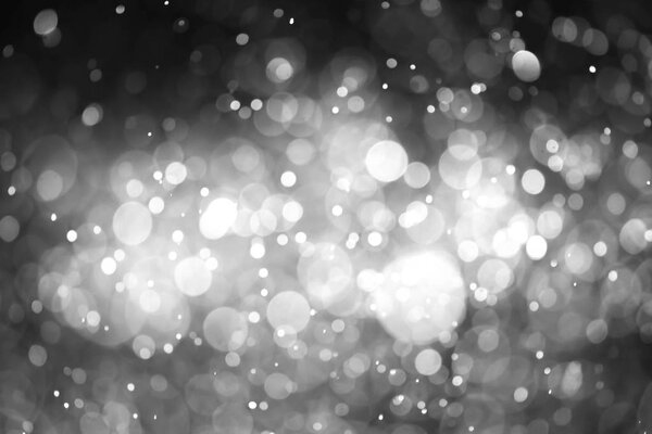 Christmas bokeh background texture abstract light glittering stars on bokeh. glitter vintage lights background