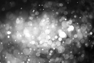 Bokeh 'te noel arkaplanı deseni soyut ışık parıldayan yıldızlar. simli klasik ışık arkaplanı