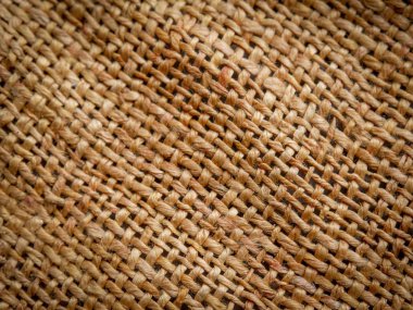 Yakın kadar kahverengi çul doku arka plan. yumuşak odak
