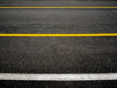 Yol çizgileri arka plan ile asfalt yüzeyi