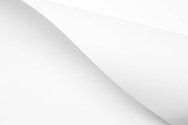 Tasarım için bükülmüş beyaz kağıt levhalar arka plan doku