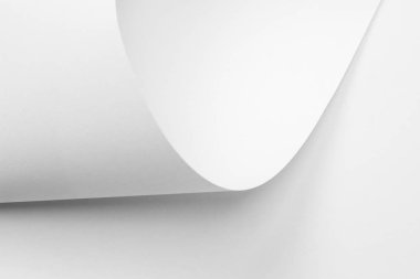 Tasarım için bükülmüş beyaz kağıt levhalar arka plan doku